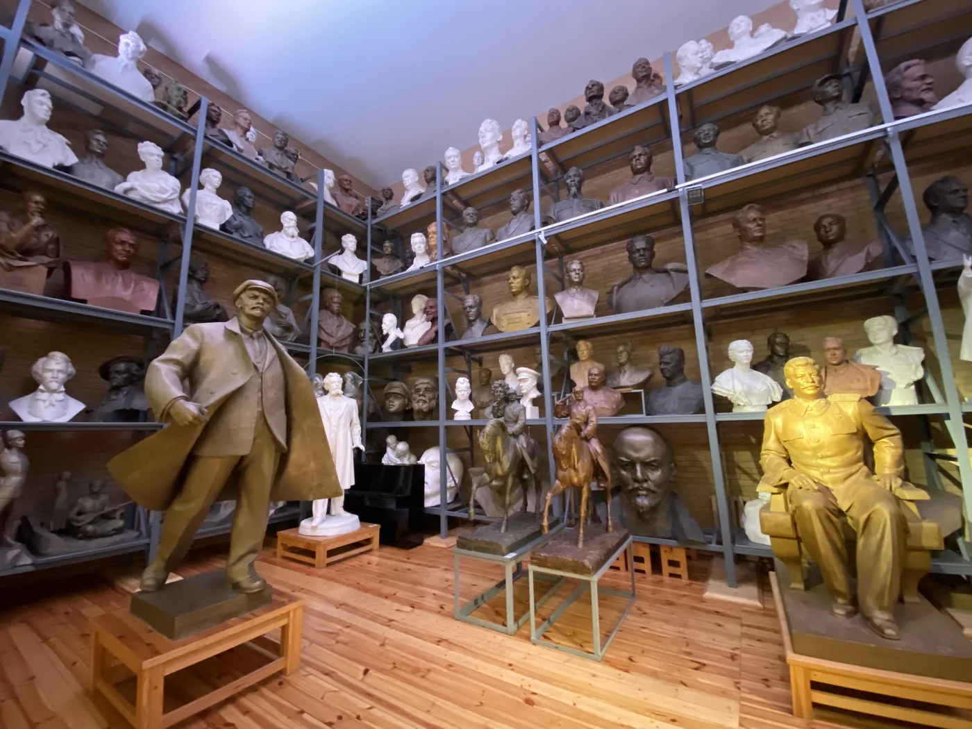 Shelves of busts of Lenin, Stalin and Marx in Zair Azgur's studio museum, Minsk