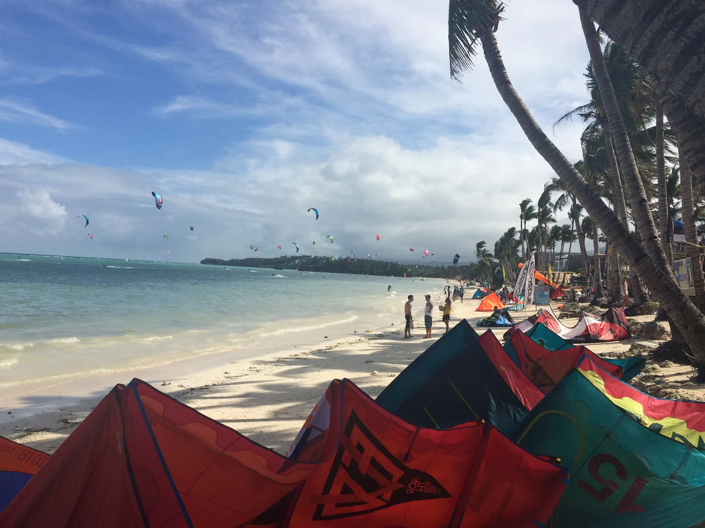 Kites on Bulabog Beach, kiteboarders out on the water