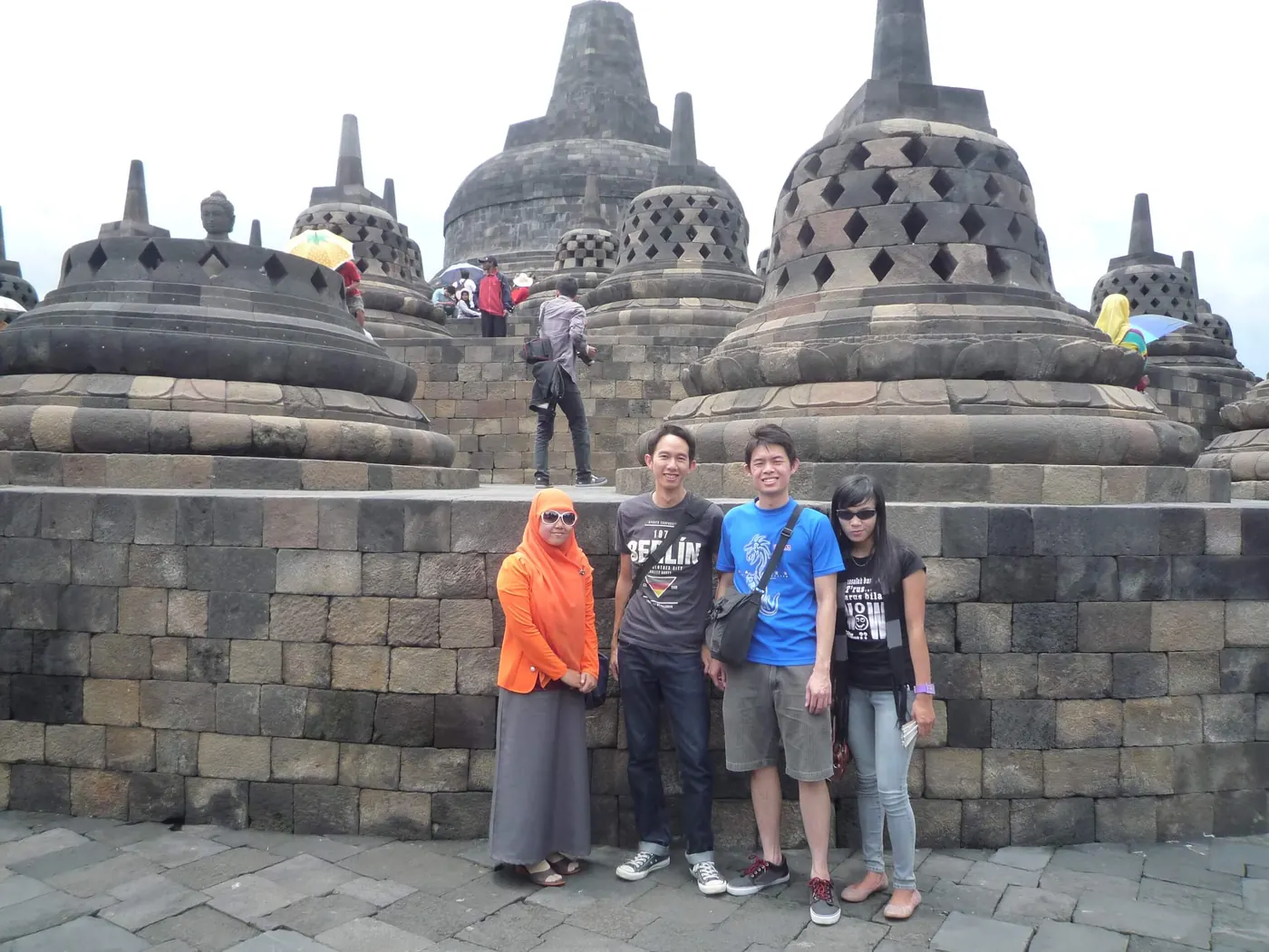 A photo with locals among the stupas of Borobudur