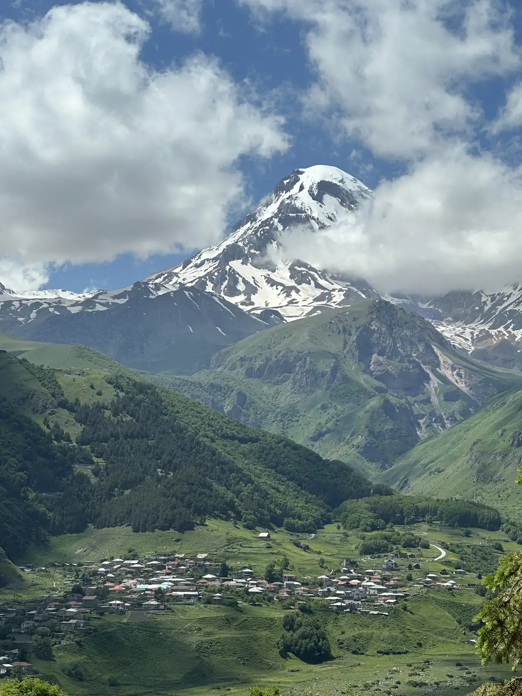 Snow-capped Mount Kazbek above the town of Kazbegi, Georgia