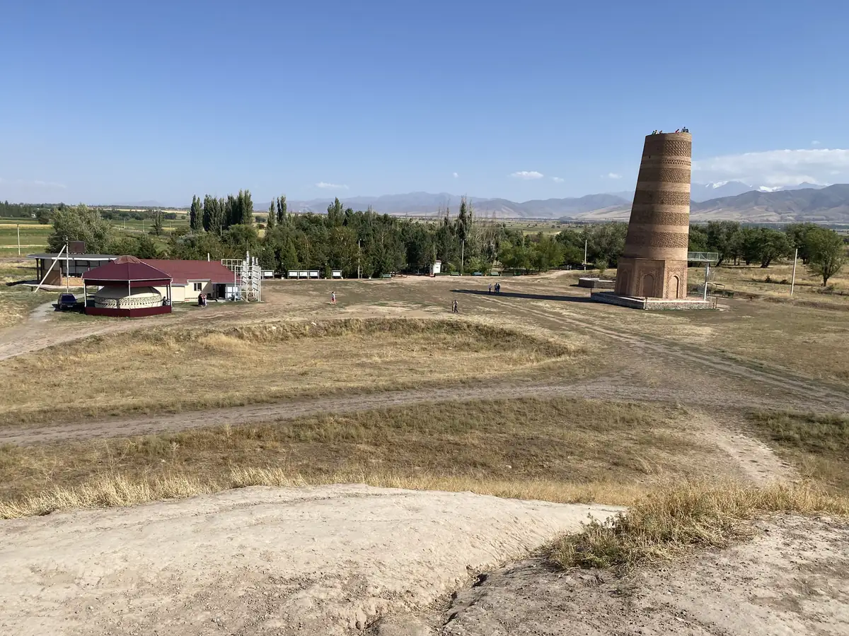 The Burana Tower minaret with the Tian Shan mountains behind