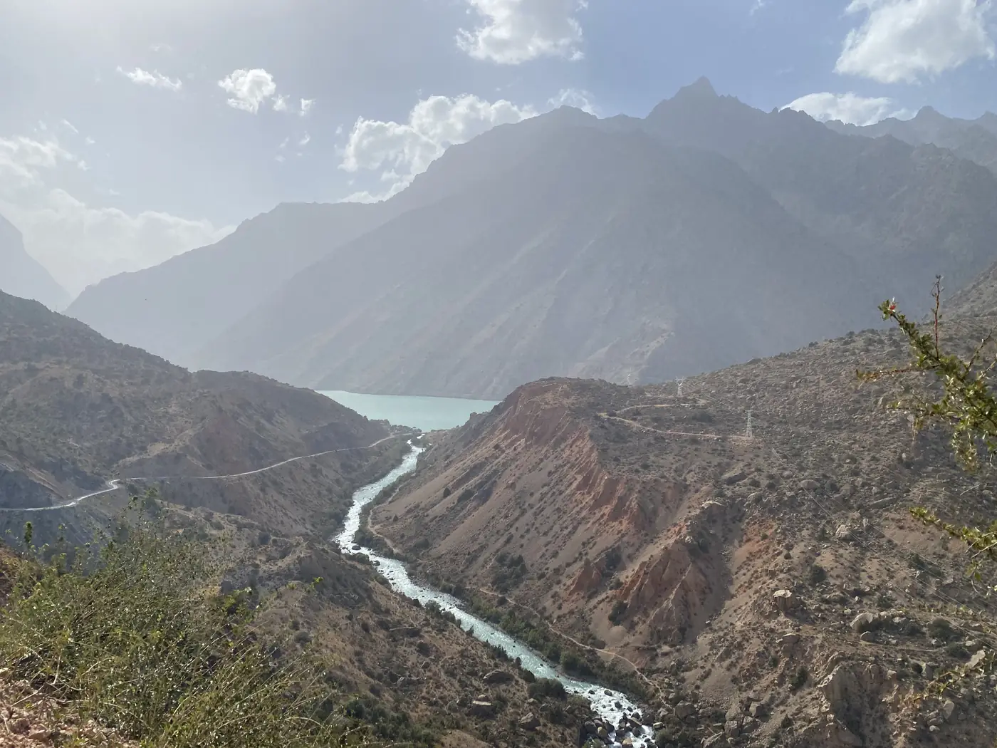 The Iskandar Darya river winding down the gorge to the lake