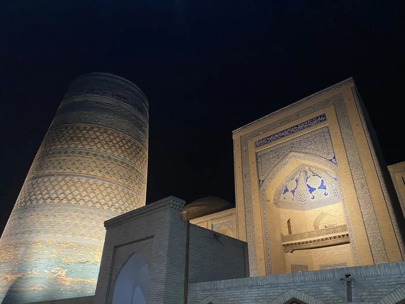 The Kalta Minor minaret lit up at night in Khiva
