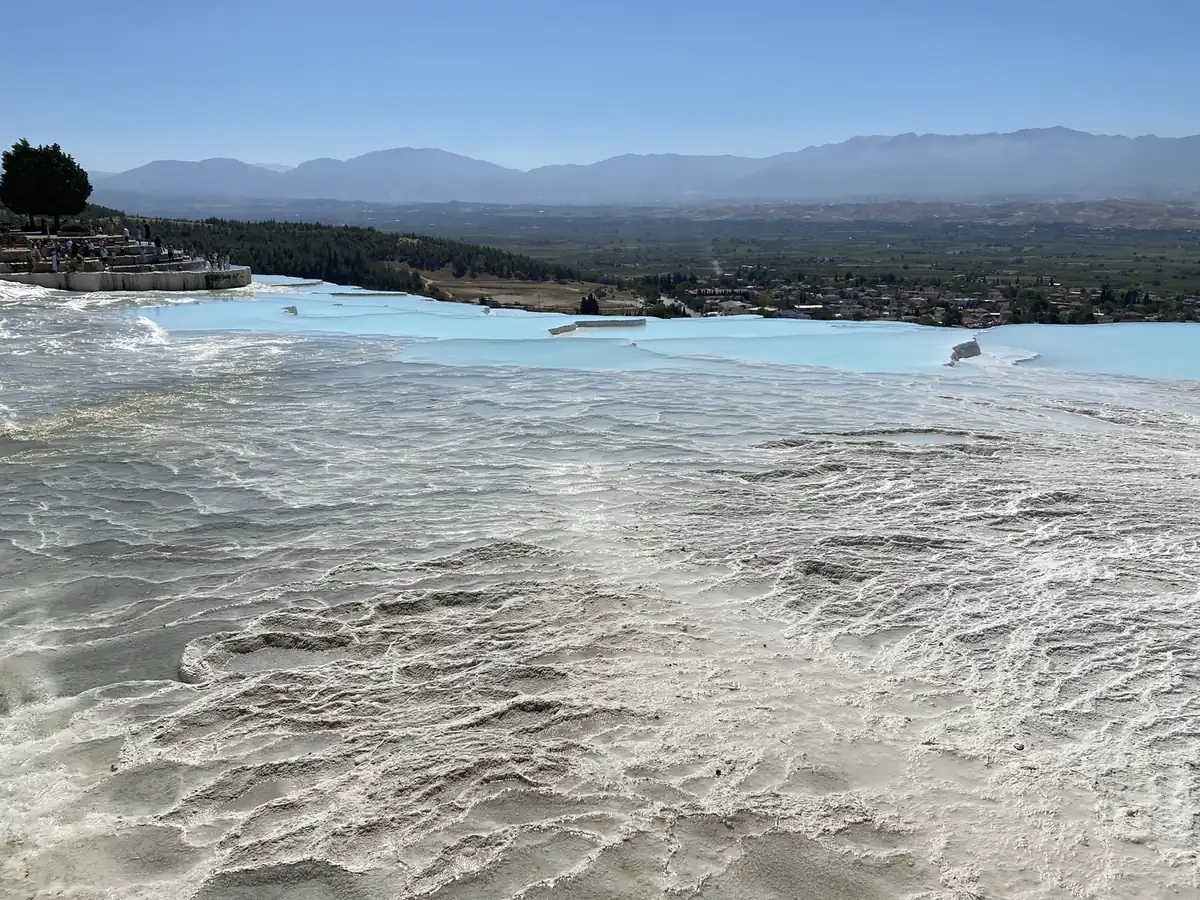 White travertine terraces and blue pools at Pamukkale