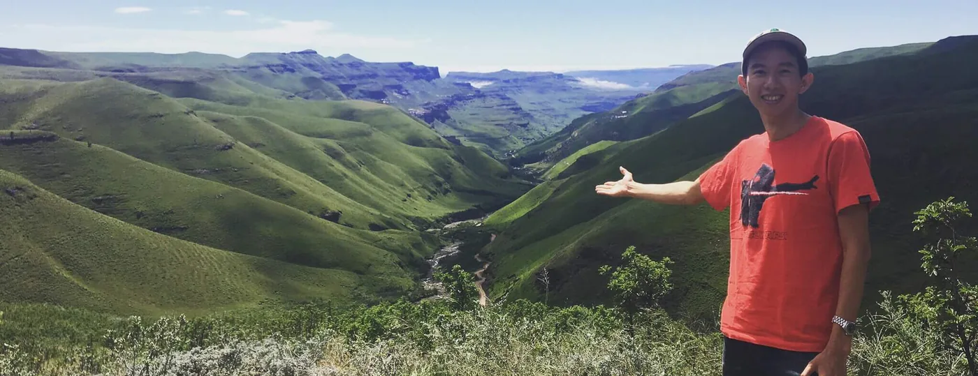 Spencer above a green valley in Lesotho
