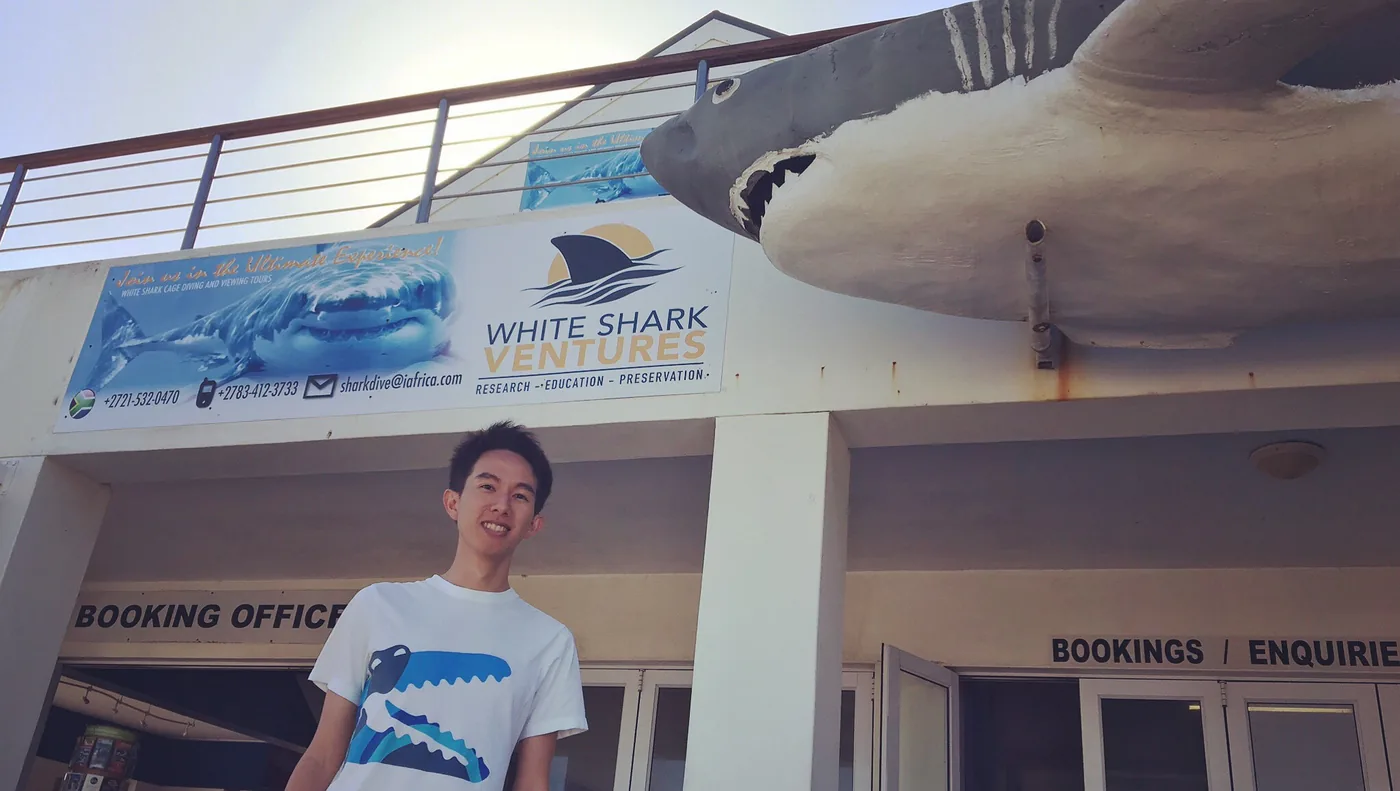 Spencer at the shark cage diving office