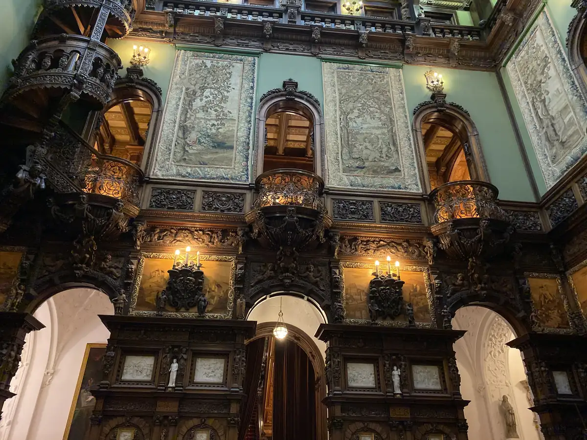 The carved wooden hall inside Peles Castle