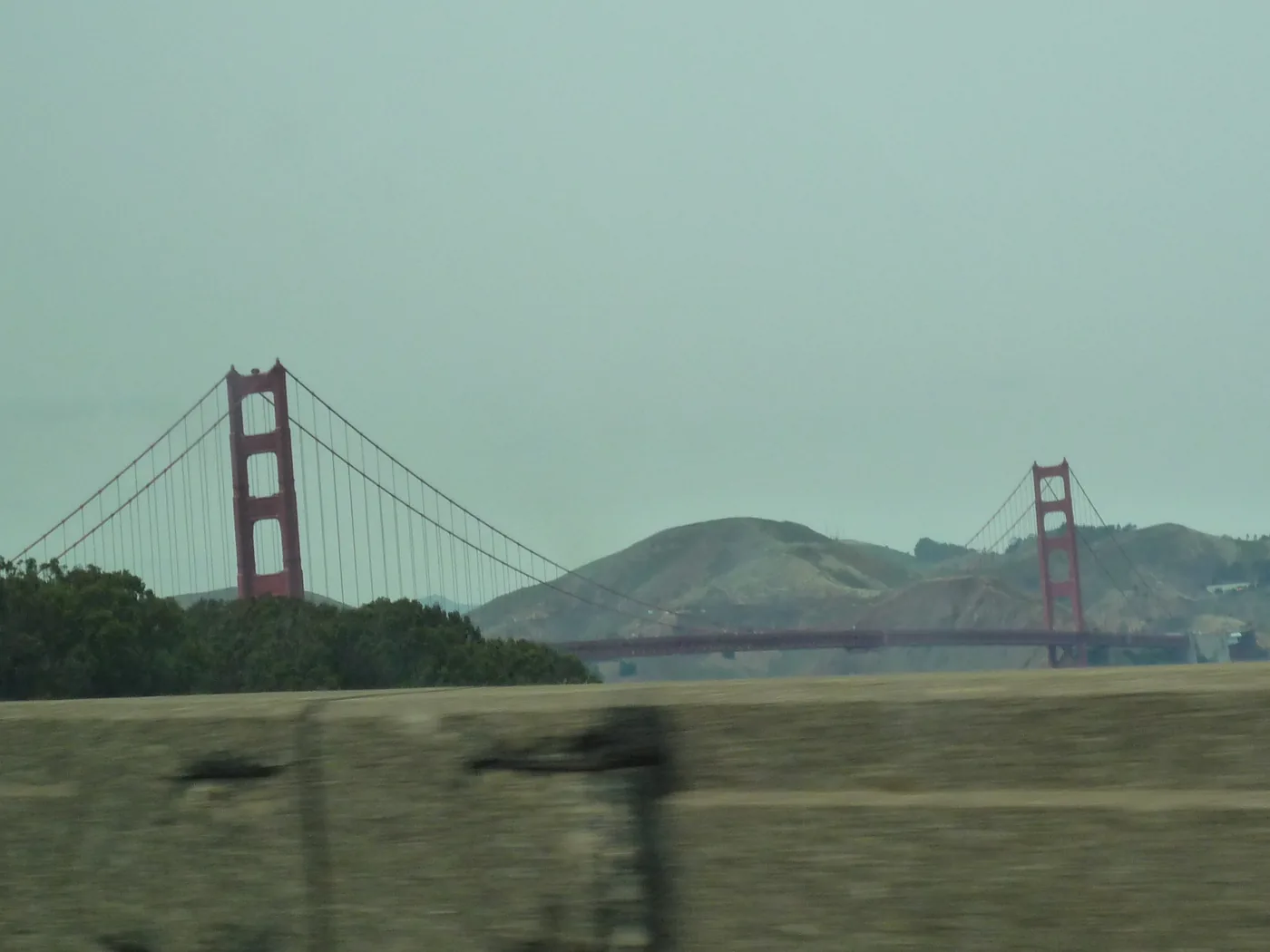 The Golden Gate Bridge from a moving car