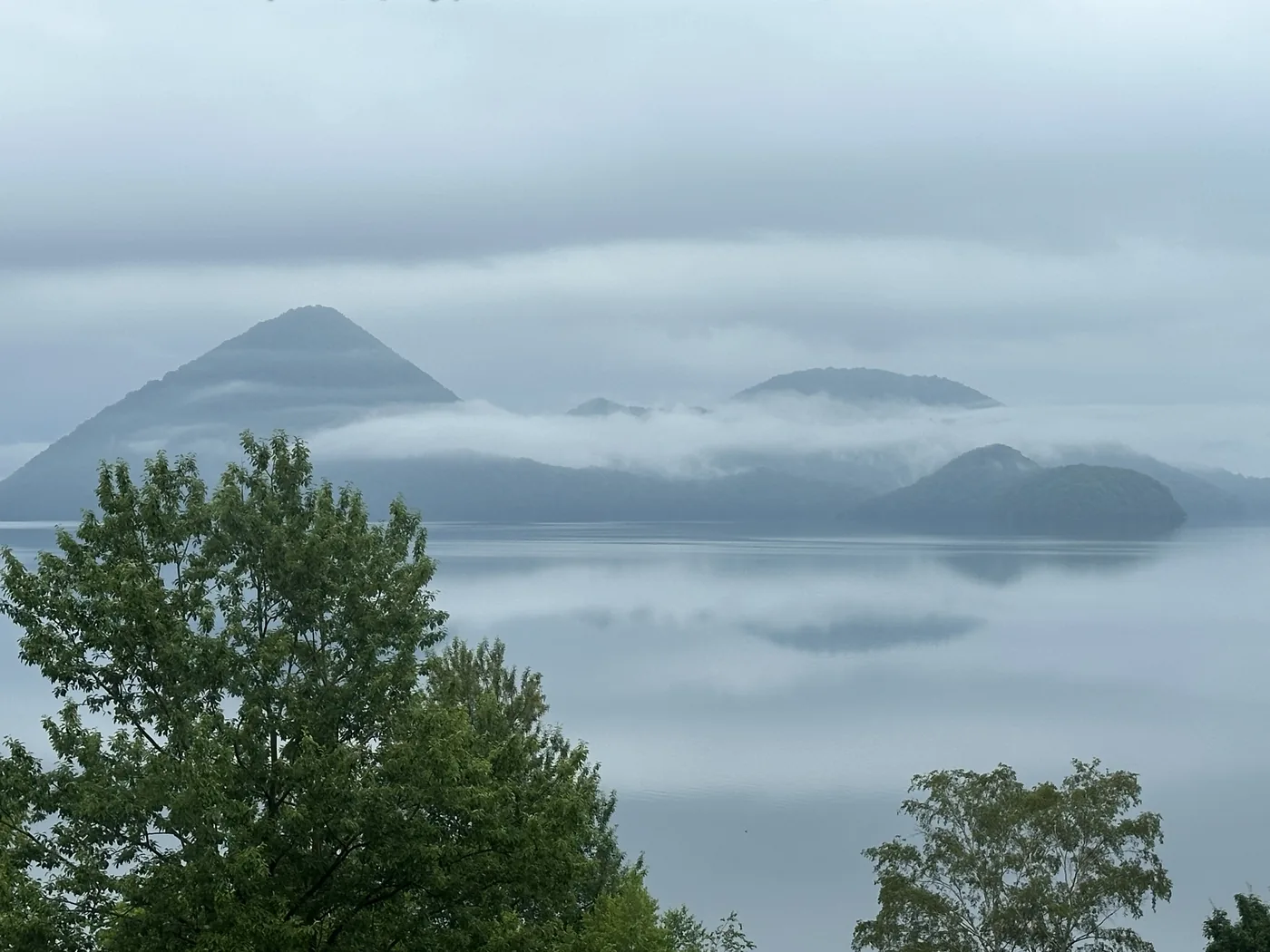 Lake Toya and Nakajima in mist and rain