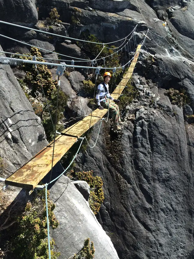 The plank bridge on the rock face