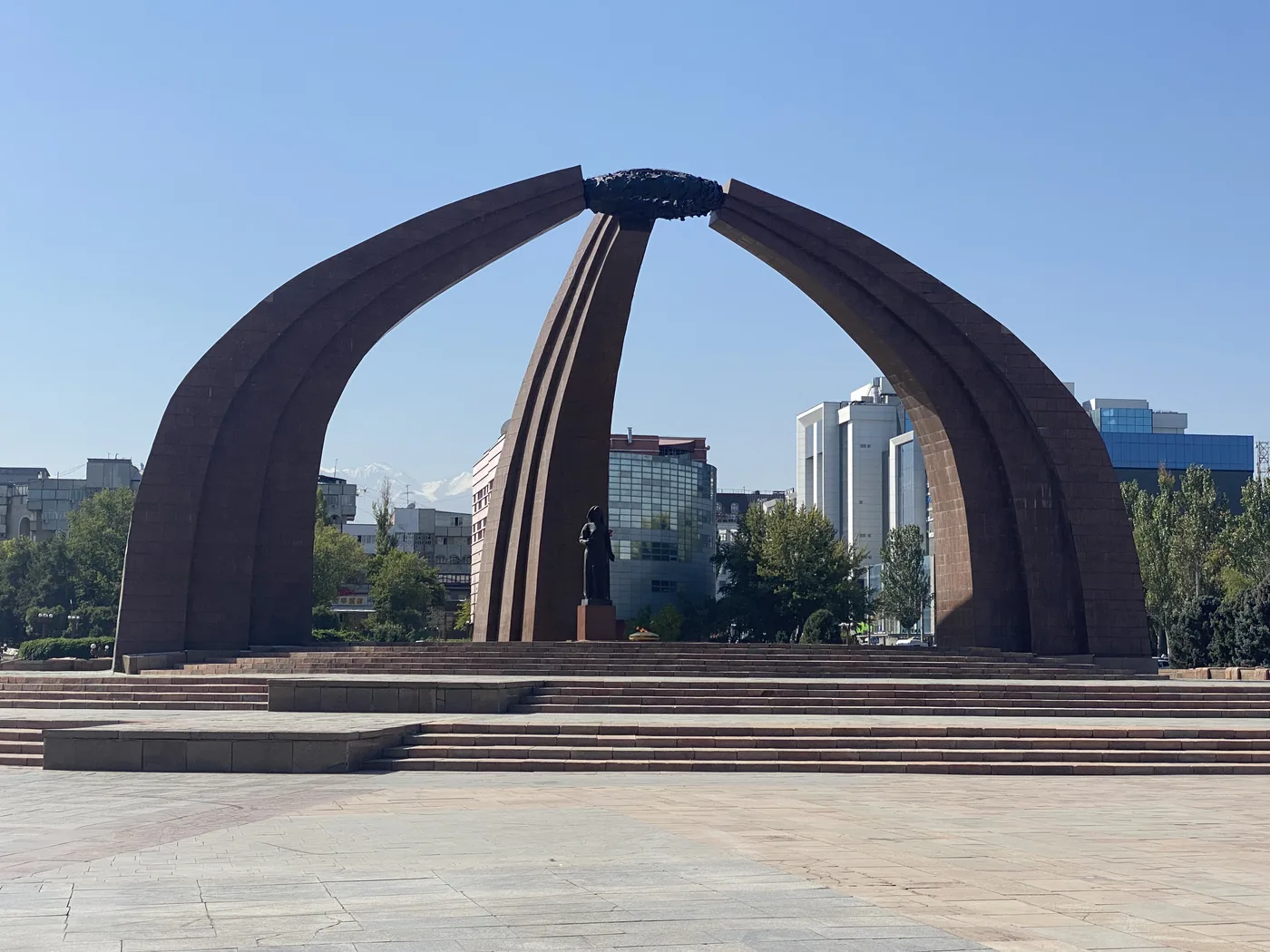 The three curved arches of Victory Square in Bishkek