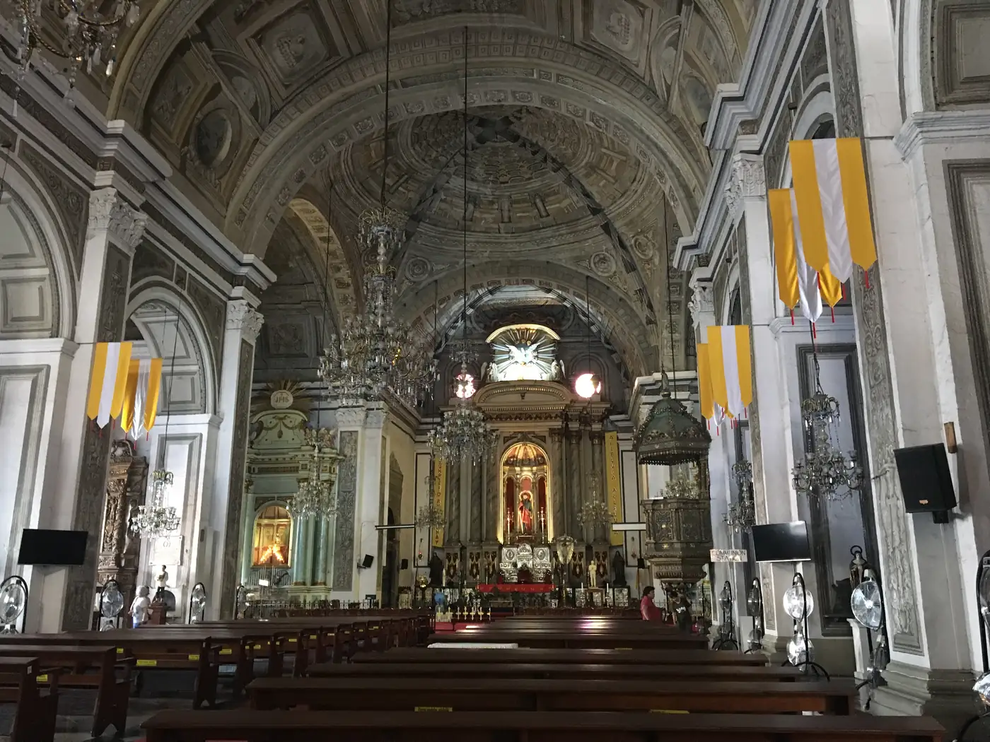 San Agustin Church, the nave and the gilded altar