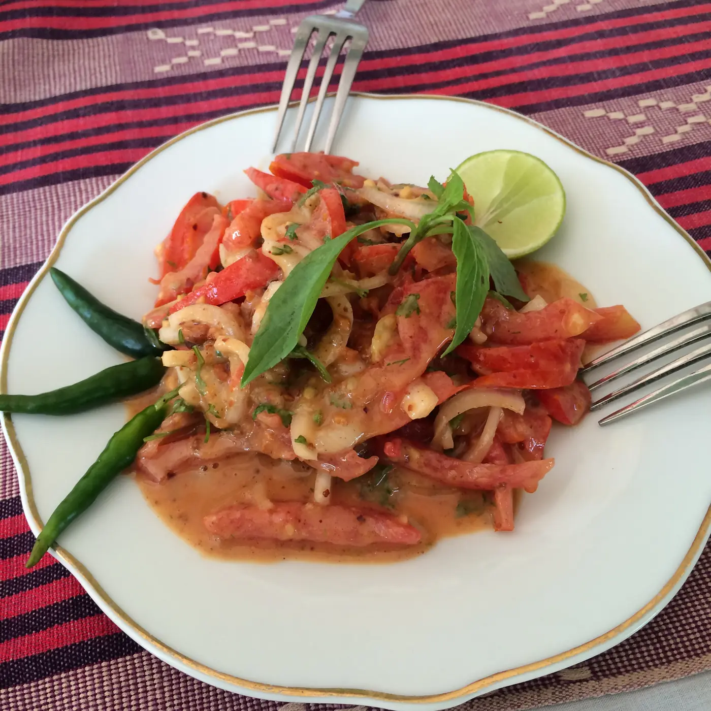A tomato salad with green chillies at lunch in Bagan