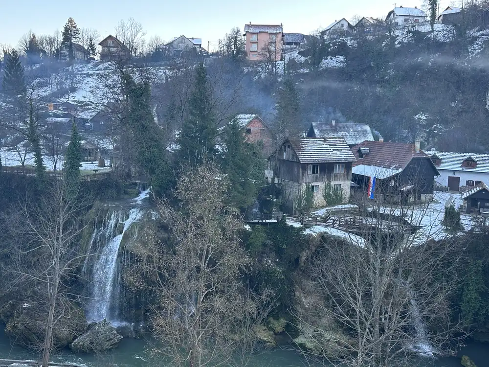 Rastoke: waterfalls under old houses, light snow