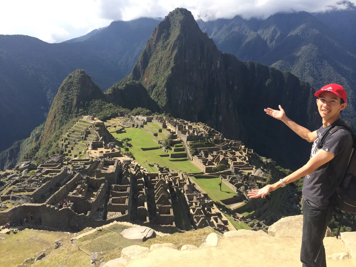 Spencer at Machu Picchu, Huayna Picchu behind, in the afternoon sun