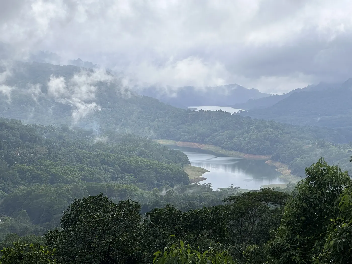 Misty hill country and a reservoir, from Ramboda