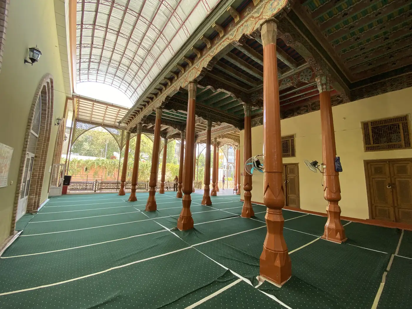 Carved wooden columns in a mosque prayer hall in Istaravshan