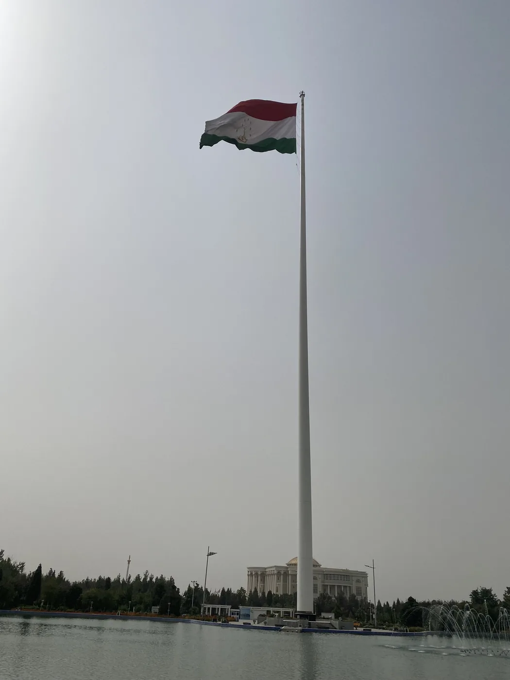 The 165-metre Dushanbe flagpole flying the Tajik flag