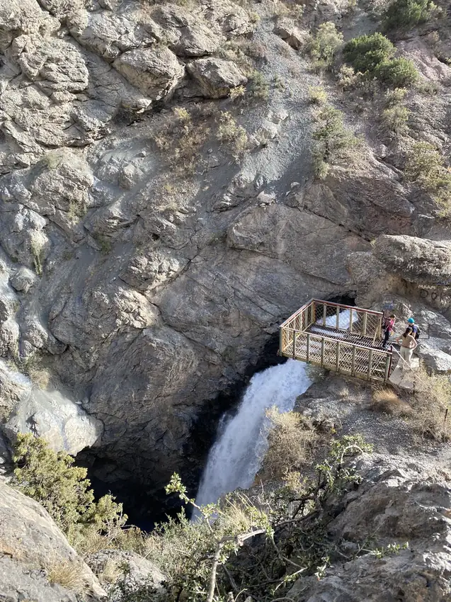 The Fan Niagara waterfall dropping into a rock gorge below a viewing platform