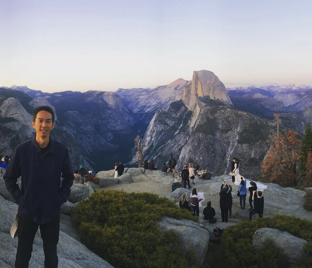 Spencer at Glacier Point in Yosemite, with Half Dome behind